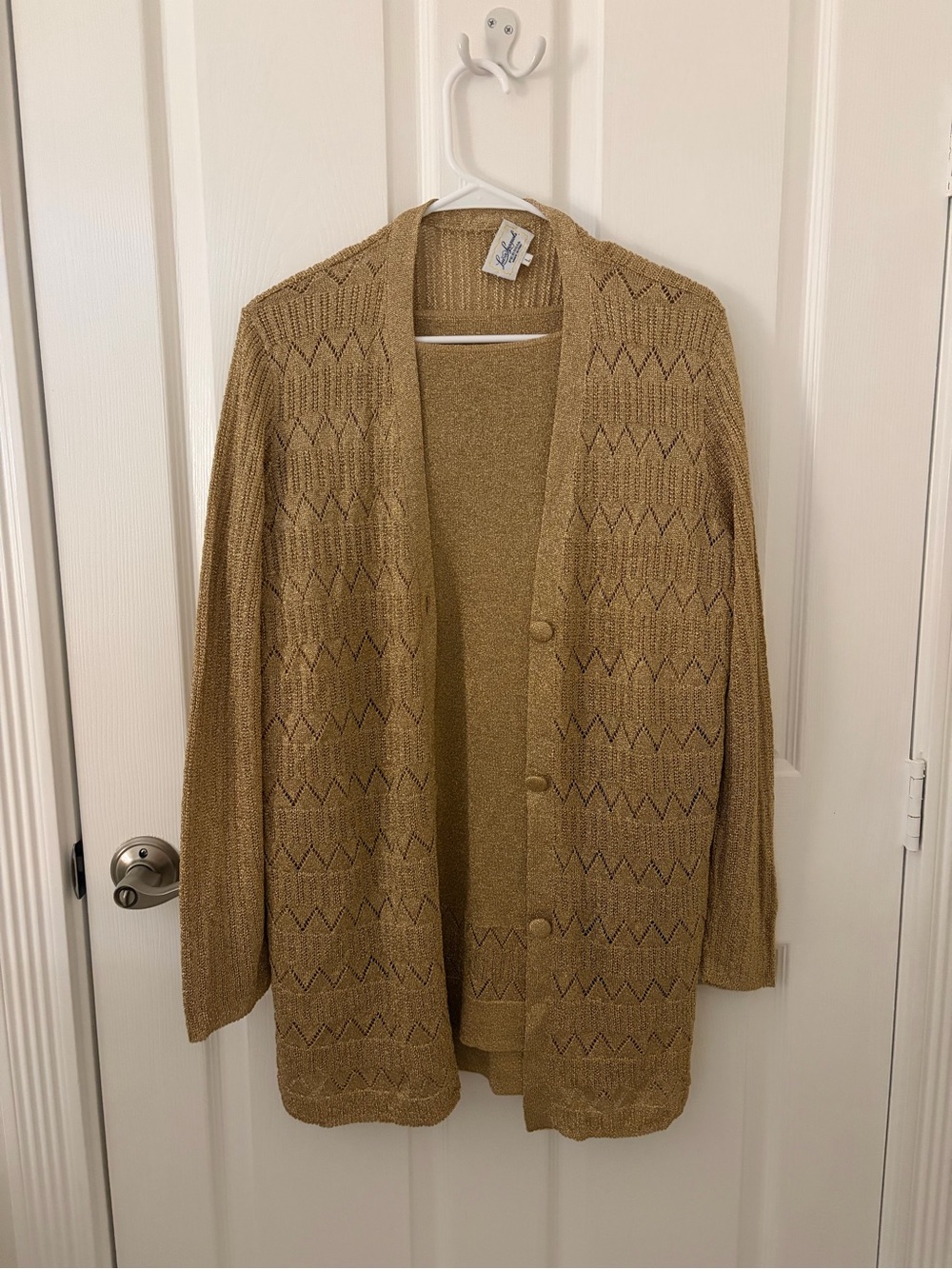 Gold cardigan and shirt set with zigzag knit pattern